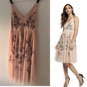 Tattoo Express dress. Lace overlay and embroidery